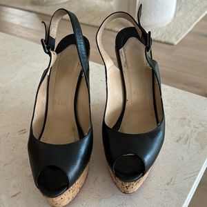 Christian louboutin    black leather wedges in great condition
